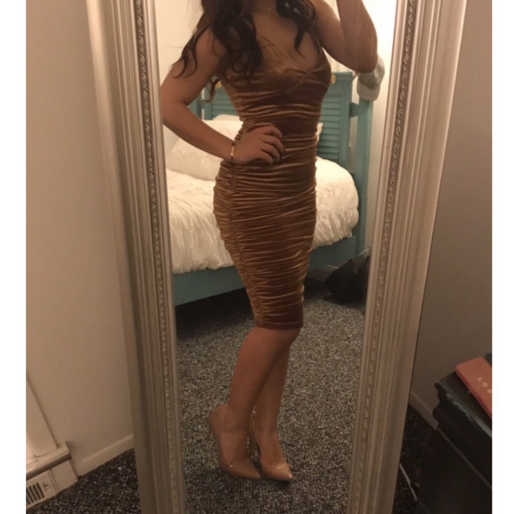 A brown ruched Midi velvet dress